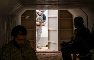Members of Team PSAB participate in Exercise Rising Phoenix at Prince Sultan Air Base, Kingdom of Saudi Arabia, May 26, 2023. U.S. Airmen, U.S. Soldiers and members of the Royal Saudi Air Force participated in the Bunker Dive exercise, which evaluated the overall readiness of base personnel during a simulated alarm scenario. (U.S. Air Force photo by Senior Airman Stephani Barge)