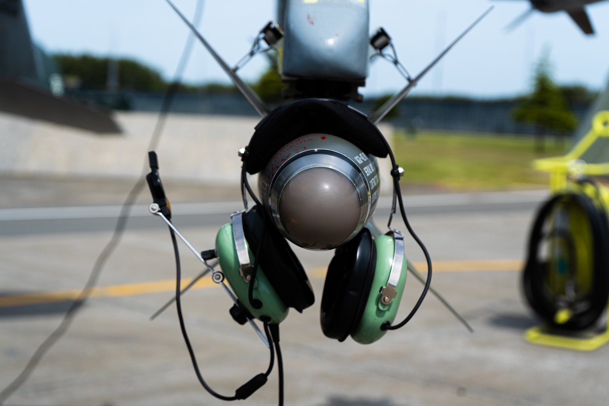 A pair of headphones belonging to a crew chief assigned to the 14th Fighter Generation Squadron, is placed on an F-16 Fighting Falcon during a Pacific Weasel exercise at Misawa Air Base, Japan, May 26, 2023. This exercise series enhances the defense capabilities of U.S. Forces Japan, and it supports the U.S. commitment to defending a free and open Indo-Pacific region. (U.S. Air Force photo by Airman 1st Class William Rodriguez)