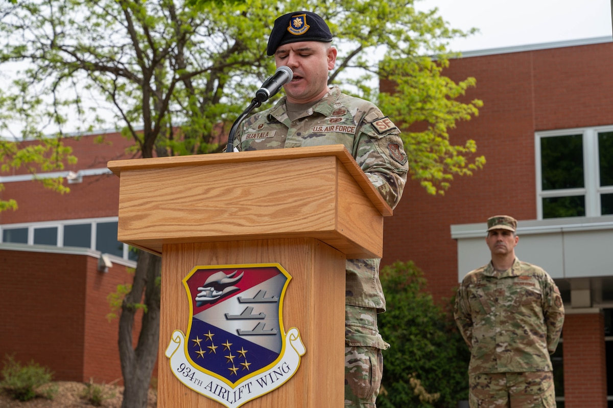 Maj. Ryan Buatala, the 934th Security Forces Squadron commander, gives a speech during the National Police Week 2023 ceremony at the Minneapolis-St. Paul Air Reserve Station, Minnesota, May 17, 2023. National Police Week 2023 was held from May 14th to May 20th to honor those who have served and are currently serving in the Law Enforcement profession. (U.S. Air Force photo by Senior Airman Matthew Reisdorf)