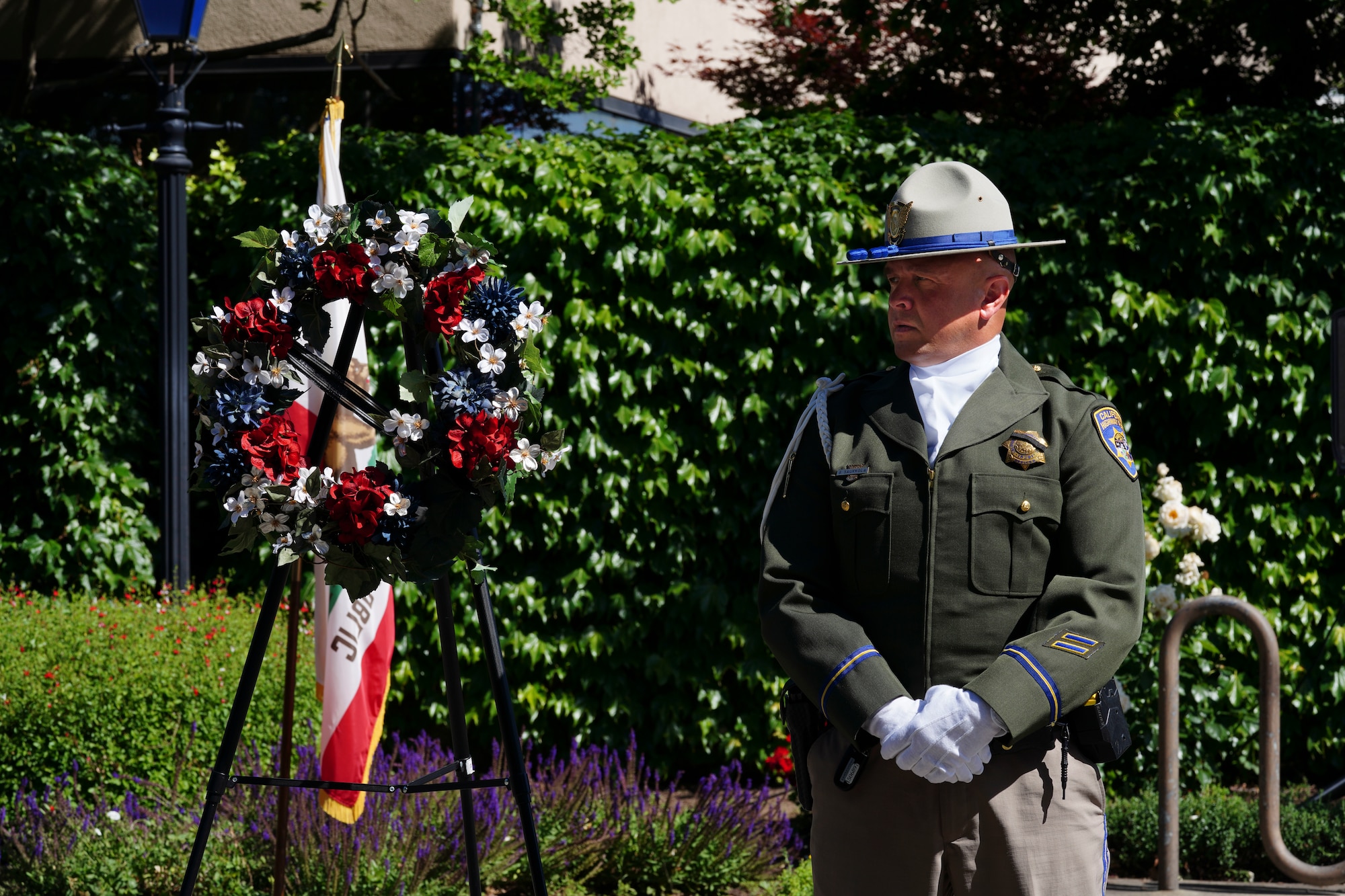 A California Highway Patrolman stands during the 2023 Regional Peace Officers’ Memorial Ceremony, May 17, 2023, in Yuba City, California.