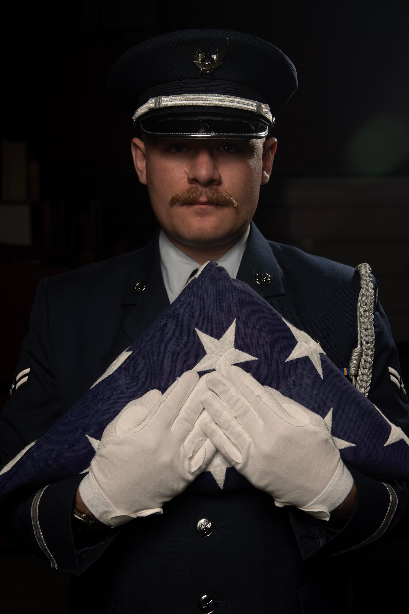 U.S. Air Force Airman 1st Class Jacob Cressy, 9th Reconnaissance Wing honor guardsman, holds the U.S. Flag, May 16, 2023, at Beale Air Force Base, California.