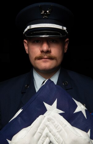 U.S. Air Force Airman 1st Class Jacob Cressy, 9th Reconnaissance Wing honor guardsman, holds the U.S. Flag, May 16, 2023, at Beale Air Force Base, California.