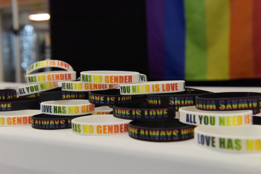 Bracelets are displayed at the LGBTQI+ Pride Month opening ceremony at Minot Air Force Base, North Dakota, June 1, 2023. LGBTQI+ Pride Month is celebrated annually in June to honor members of the LGBTQI+ community. (U.S. Air Force photo by Airman 1st Class Kyle Wilson)