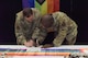 Col. Daniel Hoadley, 5th Bomb Wing commander, and Col. Kenneth McGhee, 91st Missile Wing commander, sign a proclamation at the LGBTQI+ Pride Month opening ceremony at Minot Air Force Base, North Dakota, June 1, 2023. The ceremony was held to commemorate the beginning of LGBTQI+ Pride Month. (U.S. Air Force photo by Airman 1st Class Kyle Wilson)