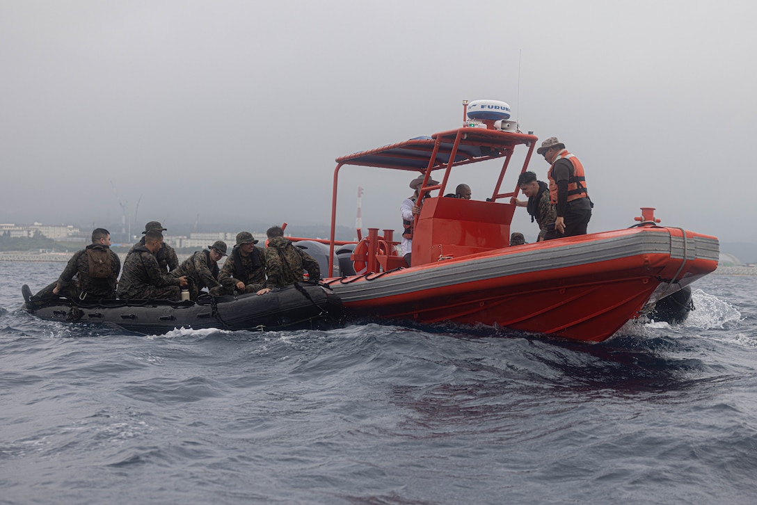 U.S. Marines with Combat Logistics Battalion 4, Combat Logistics Regiment 3, pilot a combat rubber raiding craft on route to Kin Blue during a Bushido Resupply at Camp Schwab, Okinawa, Japan, May 22, 2023. 3rd Marine Logistics Group, based out of Okinawa, Japan, is a forward-deployed combat unit that serves as III MEF’s comprehensive logistics and combat service support backbone for operations throughout the Indo-Pacific area of responsibility. (U.S. Marine Corps photo by Lance Cpl. Weston Brown)