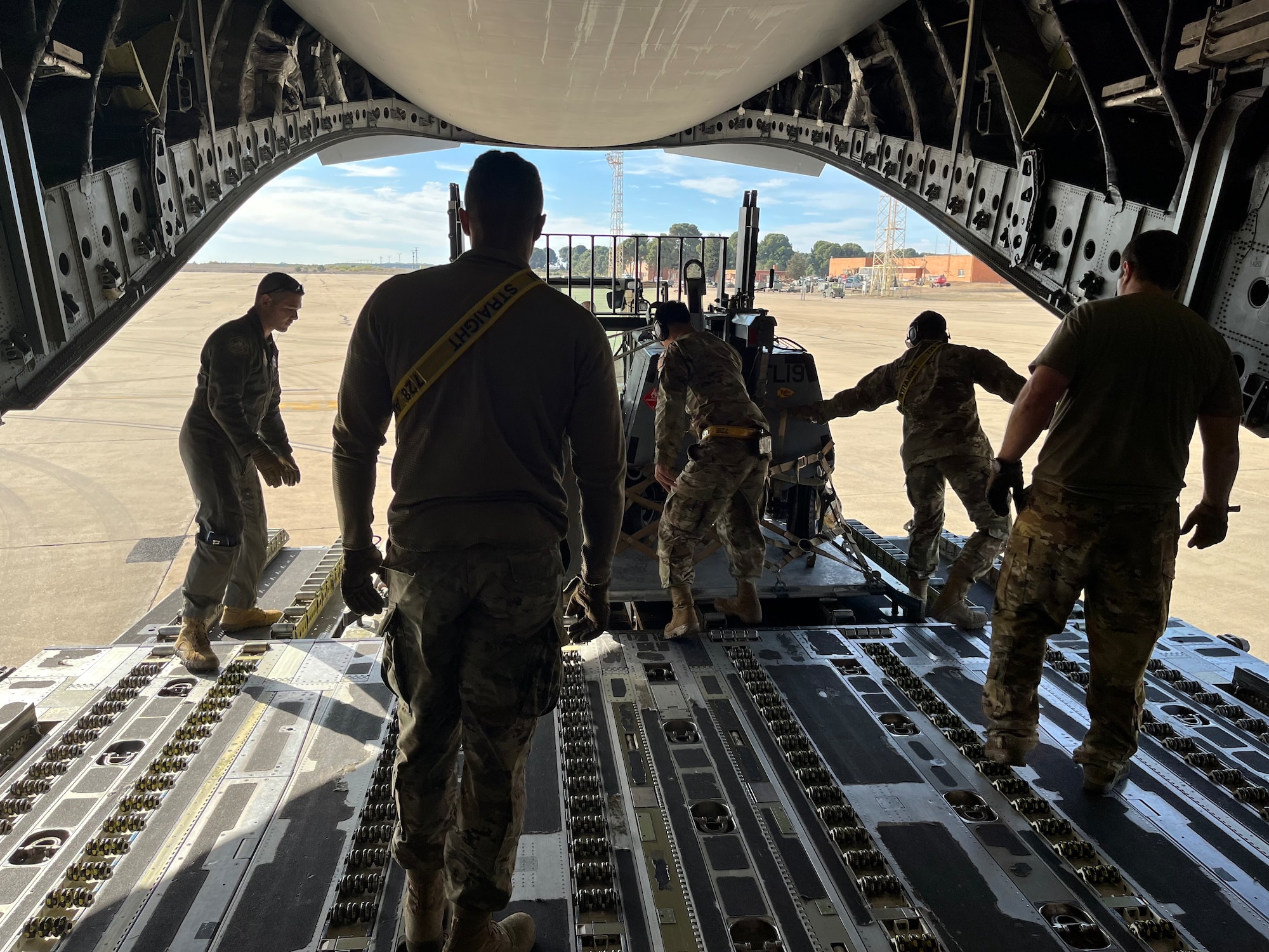 U.S. Air Force Airmen assigned to the 728th Air Mobility Squadron and 725th Air Mobility Squadron download aerospace ground equipment for A-10 Thunderbolt II at Zaragoza Air Base, Spain, May 2, 2023.