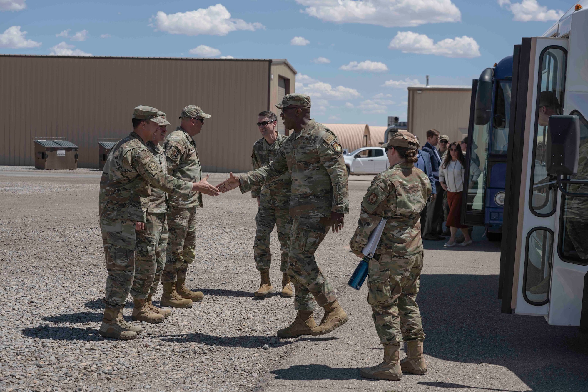 U.S. Air Force Lt. Gen. Stacey Hawkins, U.S. Air Force Sustainment Center commander, greets Airmen from the 635th Materiel Maintenance Group at Holloman Air Force Base, New Mexico, May 23, 2023. Hawkins and other senior leadership were given a familiarization tour of the 635th MMG to learn about their mission readiness capabilities. (U.S. Air Force photo by Senior Airman Antonio Salfran)