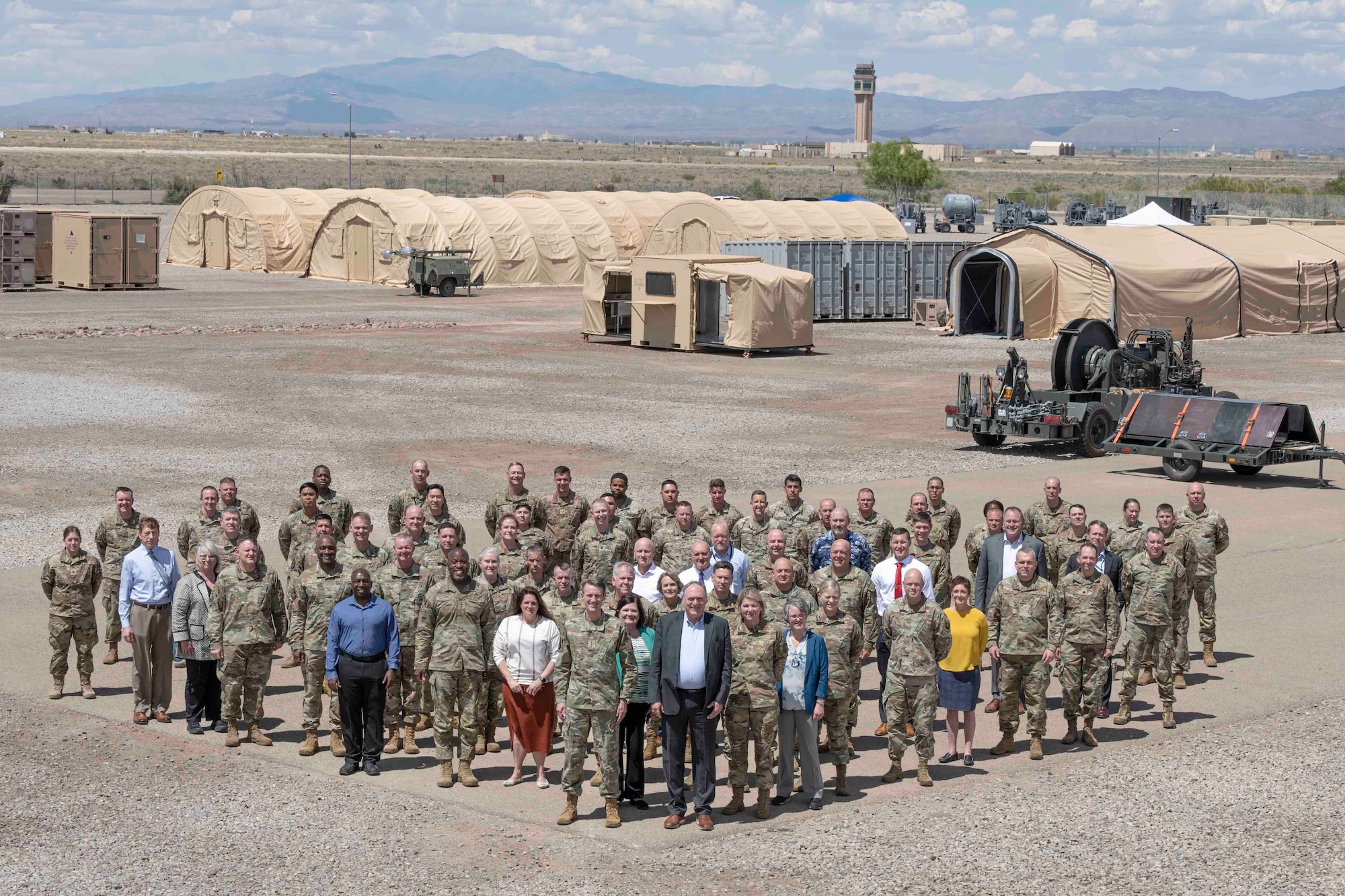 Members from the A4 Enterprise Council and the 635th Materiel Maintenance Group pose for a group photo at Holloman Air Force Base, New Mexico, May 23, 2023. The A4 Enterprise is a collaboration forum for the Department of the Air Force’s senior logistics, maintenance, engineering and security forces leaders. (U.S. Air Force photo Senior Airman Antonio Salfran)