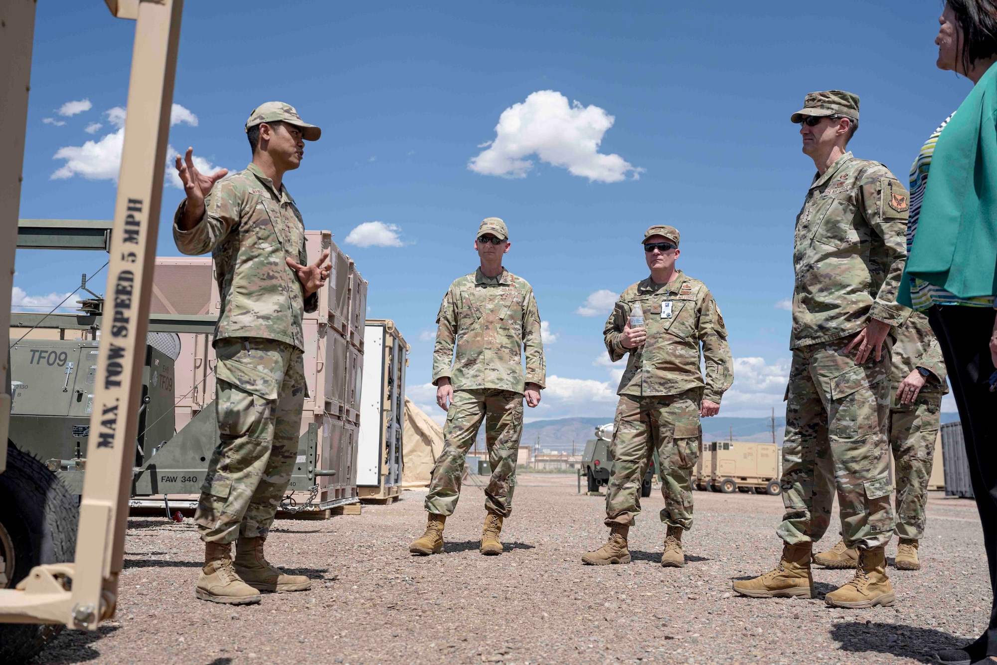 U.S. Air Force Master Sgt. Allan Manuel, 635th Materiel Maintenance Squadron director of operations, left, explains the functions of war reserve material assets to members of the A4 Enterprise Council at Holloman Air Force Base, New Mexico, May 23, 2023. The visit helped provide a detailed account of the capabilities the 635th Materiel Maintenance Group has when providing resources needed in a deployed environment. (U.S. Air Force photo by Senior Airman Antonio Salfran)