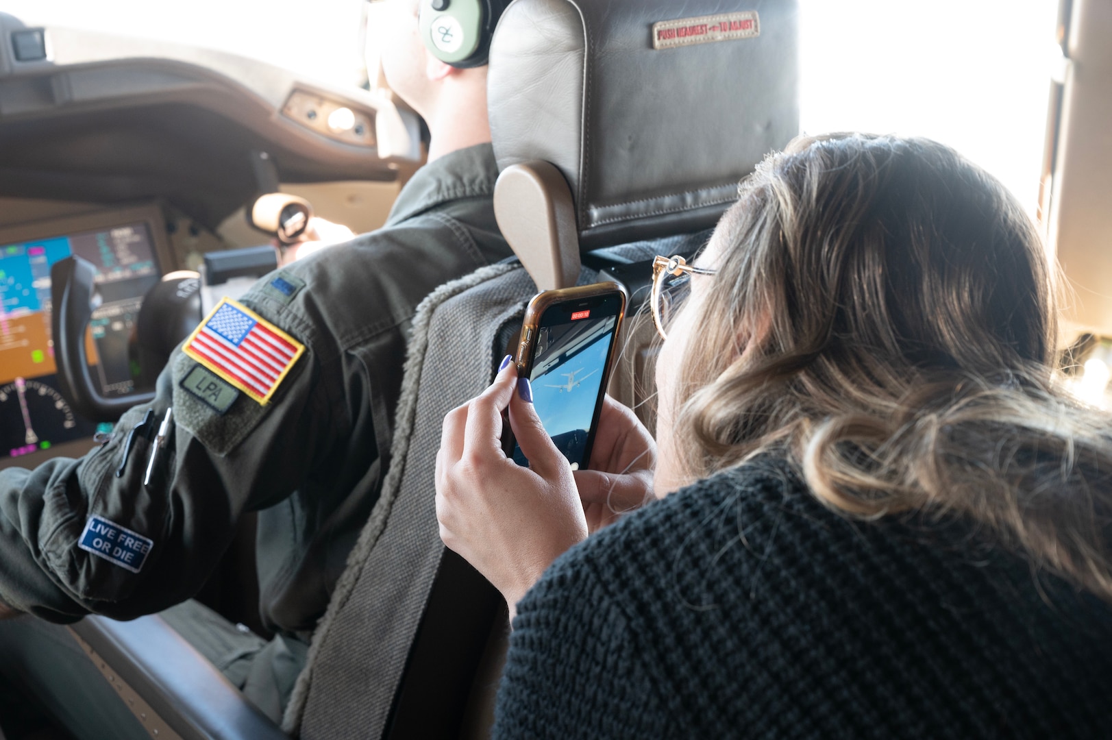 Employer takes a cell phone photo of refueling