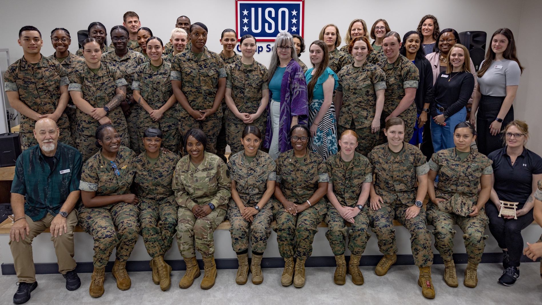 Members of the Women’s Leadership and Education Forum pose for a group picture following the WLEF’s 1-year anniversary meeting on Camp Schwab, Okinawa, Japan, May 18, 2023. WLEF celebrated its milestone with guest speakers and a guided discussion theme-focused on work-life balance as leaders. WLEF was developed to create a healthy environment for hard discussions, addressing cultural improvements, cohesion and leadership by providing opportunities for networking, support, mentorship, and career development for U.S. Marines and Sailors on Okinawa. (U.S. Marine Corps photo by Cpl. Tyler Andrews)