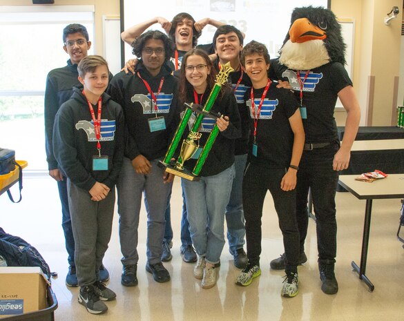 Pennsbury High School students pose with their first place trophy after winning the Naval Surface Warfare Center, Philadelphia Division (NSWCPD) and Temple University-sponsored 2023 Greater Philadelphia SeaGlide Challenge at the Temple University Ambler Campus on May 17, 2023. SeaGlide is an underwater robotics competition for middle and high school students in the Greater Philadelphia Area. (U.S. Navy photo by Sgt. Jermaine Sullivan/Released)