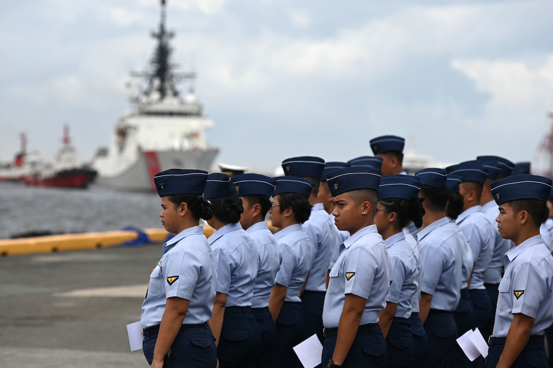 Philippine Coast Guard servicemembers play music as the U.S. Coast Guard Cutter Stratton (WMSL 752) arrives in Manila, Philippines, for a tri-lateral engagement with the Philippine and Japan Coast Guards, June 1, 2023. Stratton deployed to the Western Pacific under U.S. Navy 7th Fleet command to serve as a non-escalatory asset for the promotion of a rules-based order in the maritime domain by engaging with partner nations and allies in the region. (U.S. Coast Guard photo by Chief Petty Officer Matt Masaschi)