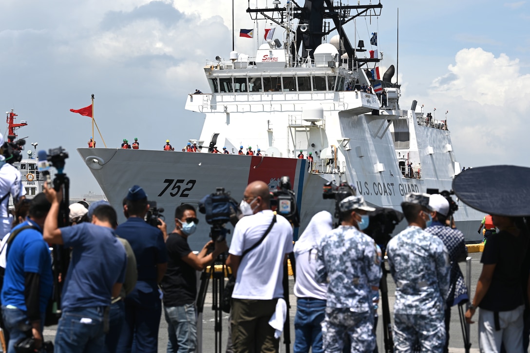 Media await the arrival of the U.S. Coast Guard Cutter Stratton (WMSL 752) and crew to Manila, Philippines, who will conduct a multi-day tri-lateral engagement with members from the Philippine and Japan Coast Guards, June 1, 2023. Stratton deployed to the Western Pacific to conduct engagements with regional allies and partner nations, reinforcing a rules-based order in the maritime domain.  (U.S. Coast Guard photo by Chief Petty Officer Matt Masaschi)