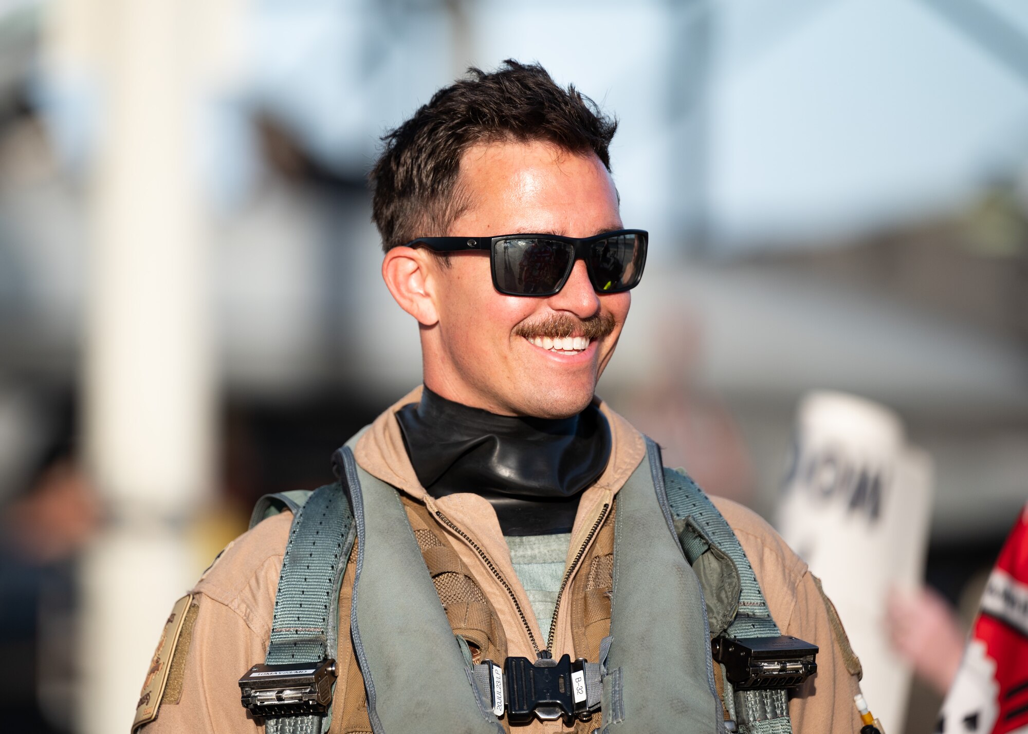An Airman greets his family members on the flightline at Shaw Air Force Base.