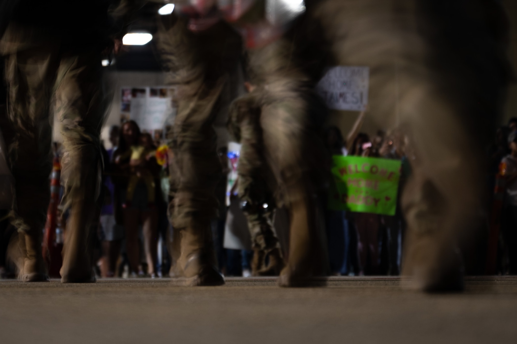 Airmen returning to Shaw Air Force Base rush to meet their families on the flightline