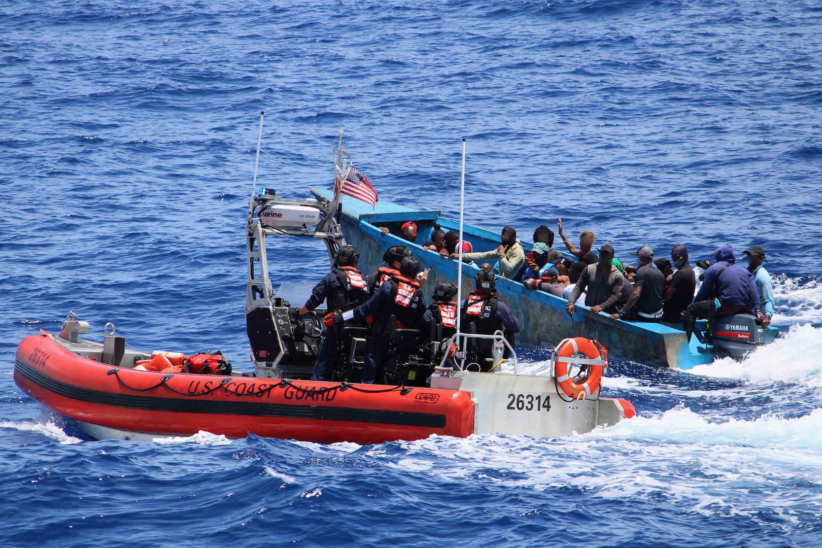 Coast Guard Cutter Donald Horsley’s small boat crew interdicts a vessel in the Mona Passage May 30, 2023. The Coast Guard returned 24 of 29 migrants from this case to the Dominican Republic June 1, 2023 while four others are facing federal prosecution at the U.S. District Court in Puerto Rico. Coast Guard crews also medevac’d a pregnant woman, who was experiencing contractions, to a local hospital in Puerto Rico. (U.S. Coast Guard photo)