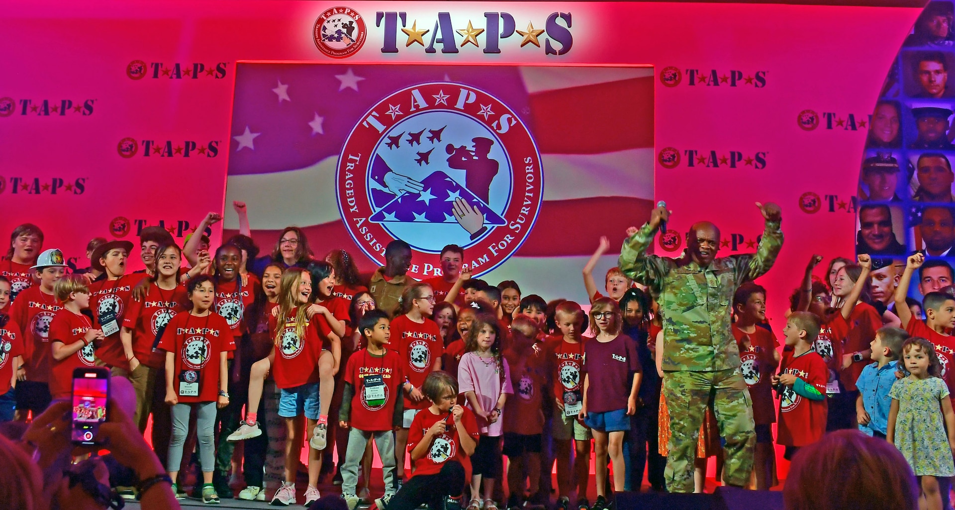 Senior Enlisted Advisor Tony L. Whitehead, SEA to the chief, National Guard Bureau, cheers with surviving military children during the Tragedy Assistance Program for Survivors’ 29th Annual National Military Survivor Seminar and Good Grief Camp, Arlington, Virginia, May 29, 2023. The seminar welcomes hundreds of surviving military families to the nation’s capital over Memorial Day weekend every year.