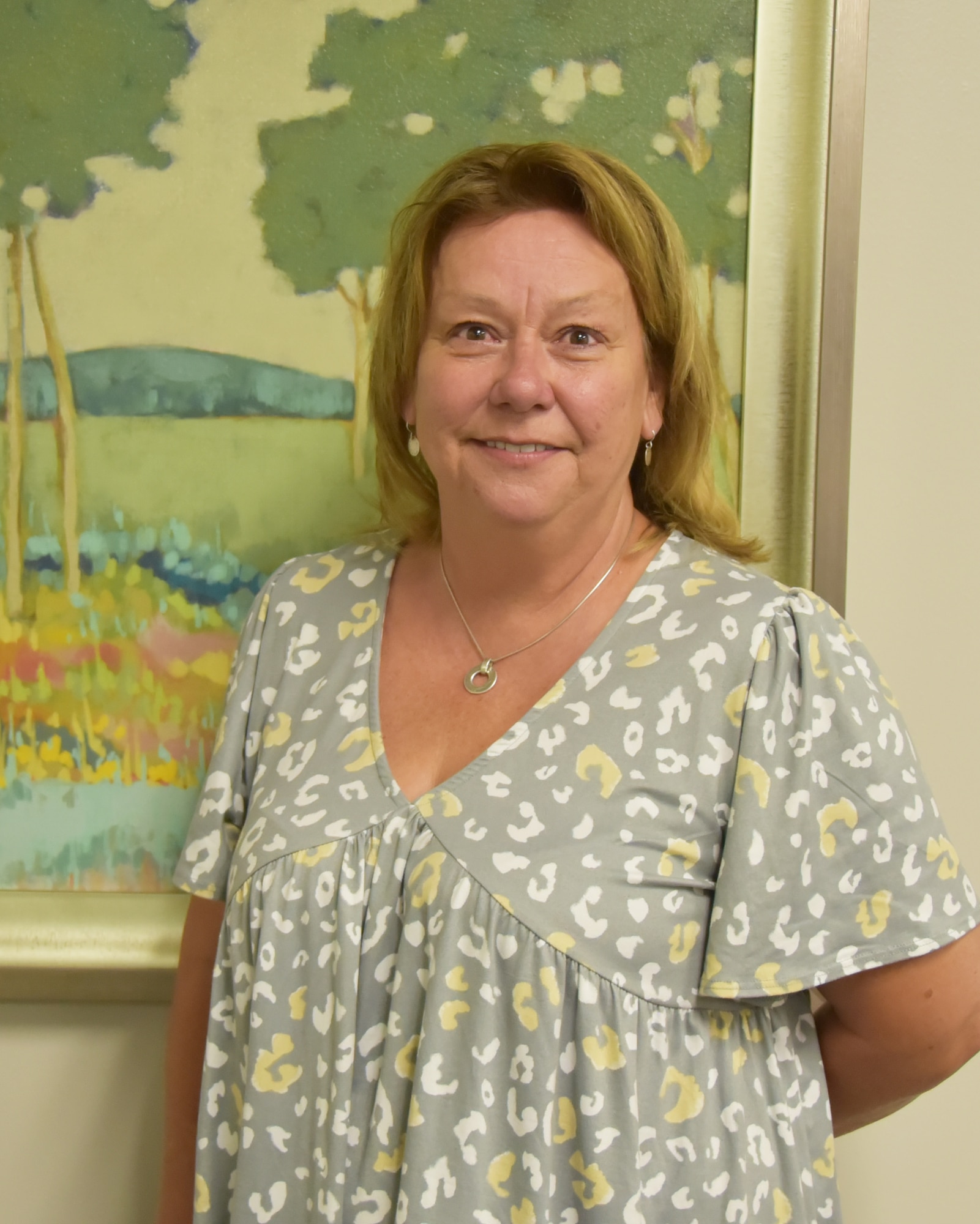 Image of Melodie Skillman, 931st Air Refueling Wing budget analyst, posing at her office June 1, 2023.