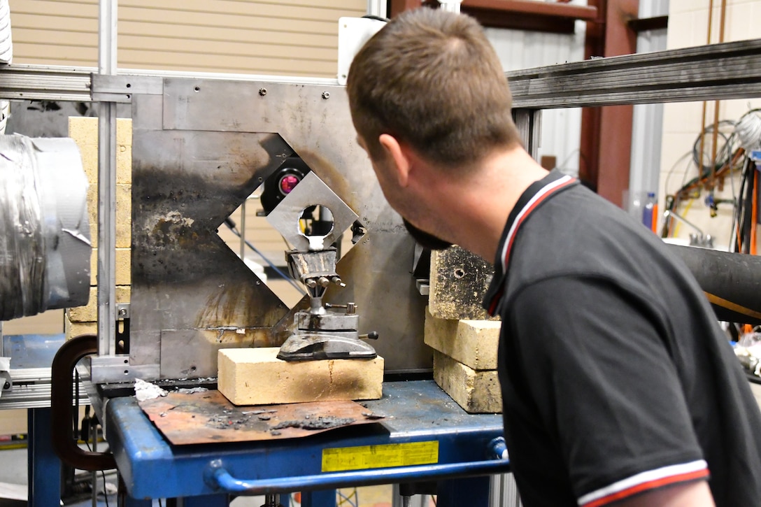 IMAGE: Department of Defense Human Factors Engineering Technical Advisory Group toured Naval Surface Warfare Center Dahlgren Division’s High Energy Laser Weapon Systems Lethality Lab.