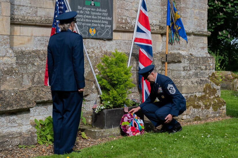 U.S. Air Force Col. Elizabeth Hanson, 305th Air Mobility Wing Commander, and U.S. Air Force Chief Master Sgt. David Kolcun, 305th AMW Command Chief, lay a commemorative wreath.