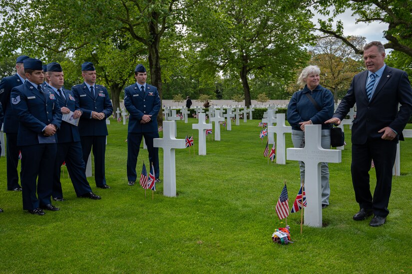 U.S. Air Force Airmen from the 305th Air Mobility Wing visit some of the fallen Airmen from the 305th Bombardment Group at the Cambridge American Cemetery.