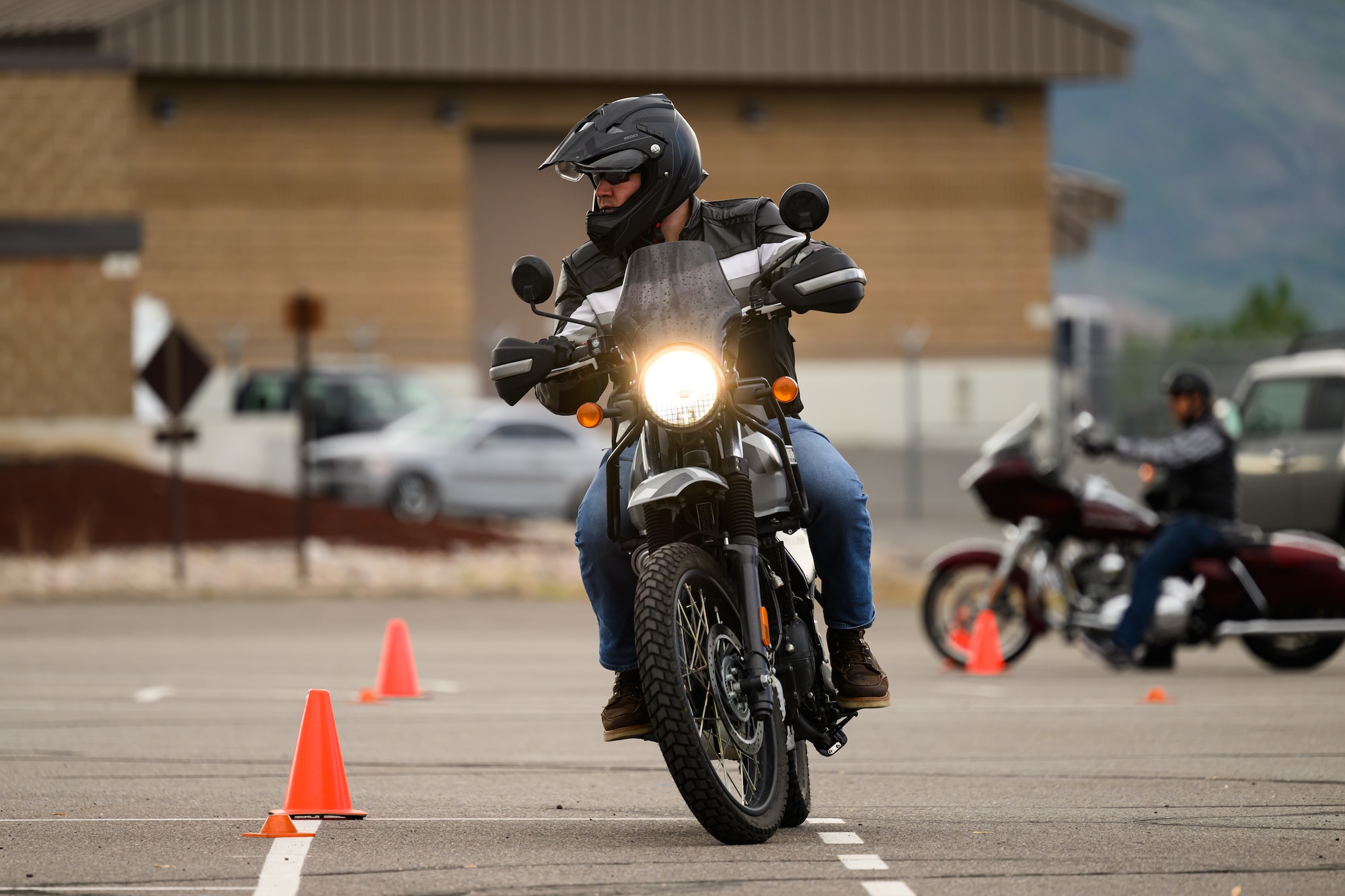 Joe Bielanski negotiates obstacles during a Basic Rider Course at Hill Air Force Base, Utah, May 26, 2023. The 75th Air Base Wing safety office maintains a SharePoint that provides motorcyclists with information and resources regarding safety, requirements and training for anyone with base access.  (U.S. Air Force photo by R. Nial Bradshaw)