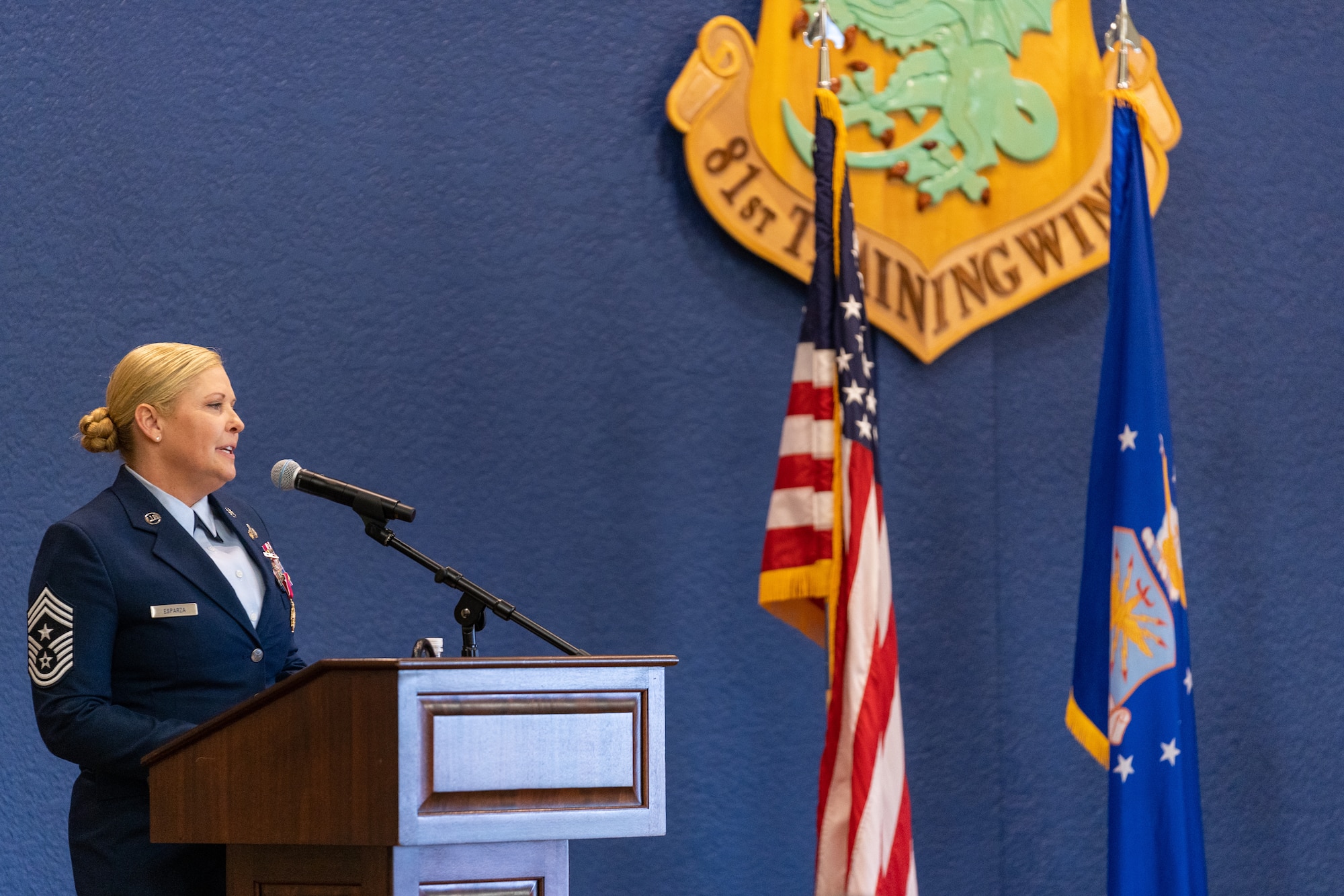 U.S. Air Force Chief Master Sgt. Sarah Esparza, 81st Training Wing command chief master sergeant, delivers remarks during her retirement ceremony at Keesler Air Force Base, Mississippi, June 1, 2023.
