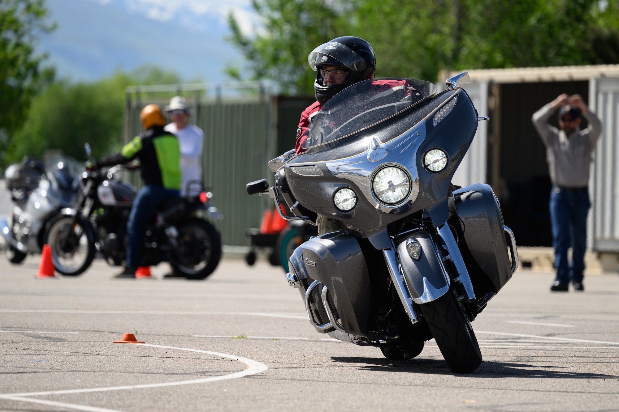 Mike Smith negotiates obstacles during a Basic Rider Course at Hill Air Force Base, Utah, May 26, 2023. The 75th Air Base Wing safety office maintains a SharePoint that provides motorcyclists with information and resources regarding safety, requirements and training for anyone with base access.  (U.S. Air Force photo by R. Nial Bradshaw)