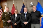 Brig. Gen. Eric Shirley with Carlos Deno, Steven Bollendorf, and Gary Pierce who are newly retired from Defense Logistics Agency Troop Support on May 31, 2023 in Philadelphia.