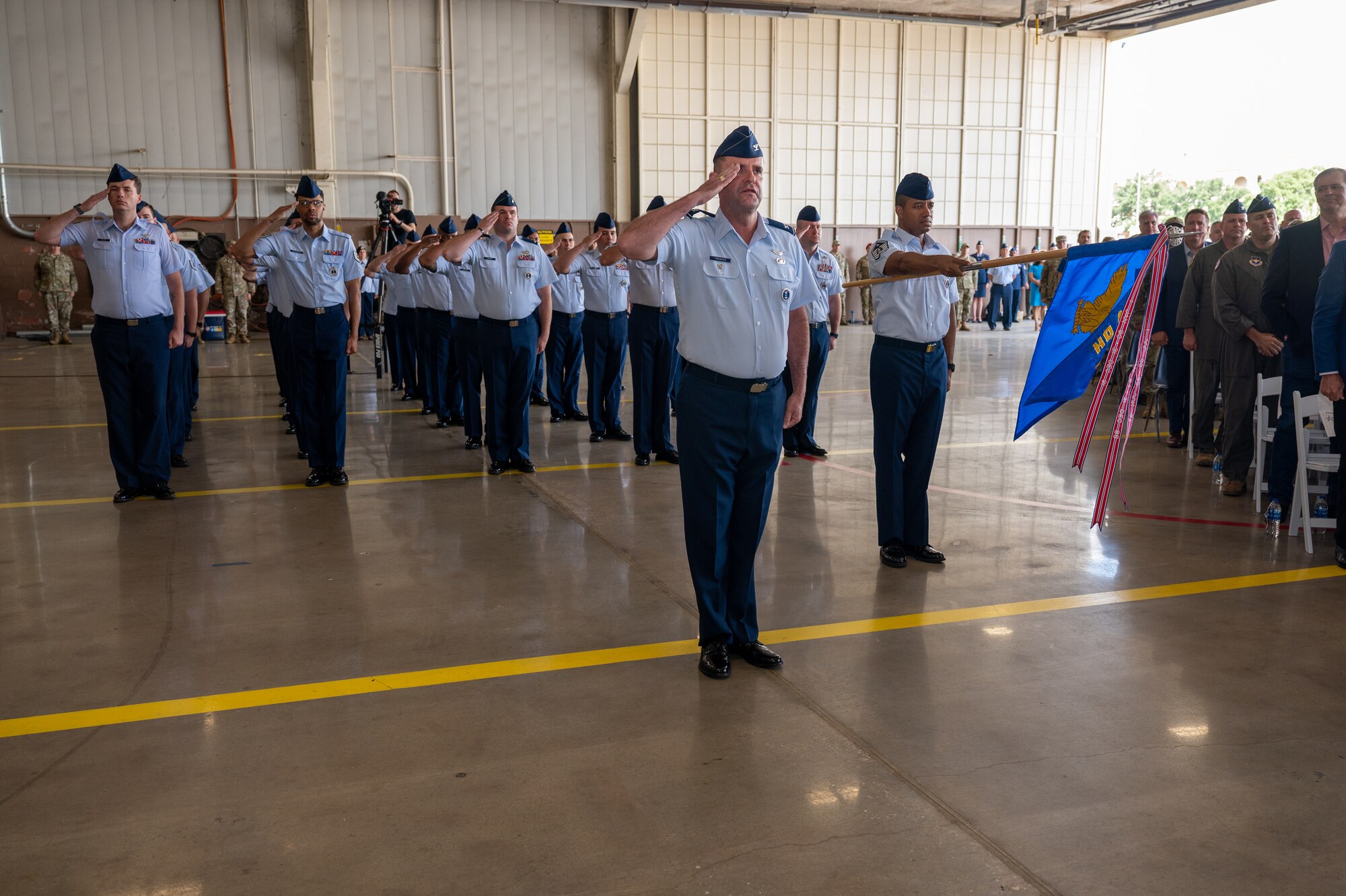 U.S. Air Force Col. Layne Trosper, plans and resources division chief, Air Force Recruiting Service, leads the AFRS flight first salute to new commander Brig. Gen. Christopher Amrhein after his assumption of AFRS command at Joint Base San Antonio-Randolph June 2, 2022