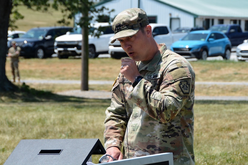 Capt. Shawn Garghill, officer in charge of the Pennsylvania Army National Guard Ambassador Demonstration Team, narrates a live-action demonstration May 31 at Fort Indiantown Gap, Pa. The 15-member team was recently formed to travel across the state to different events to help raise awareness of the National Guard and aid recruiting. (Pennsylvania National Guard photo by Brad Rhen)