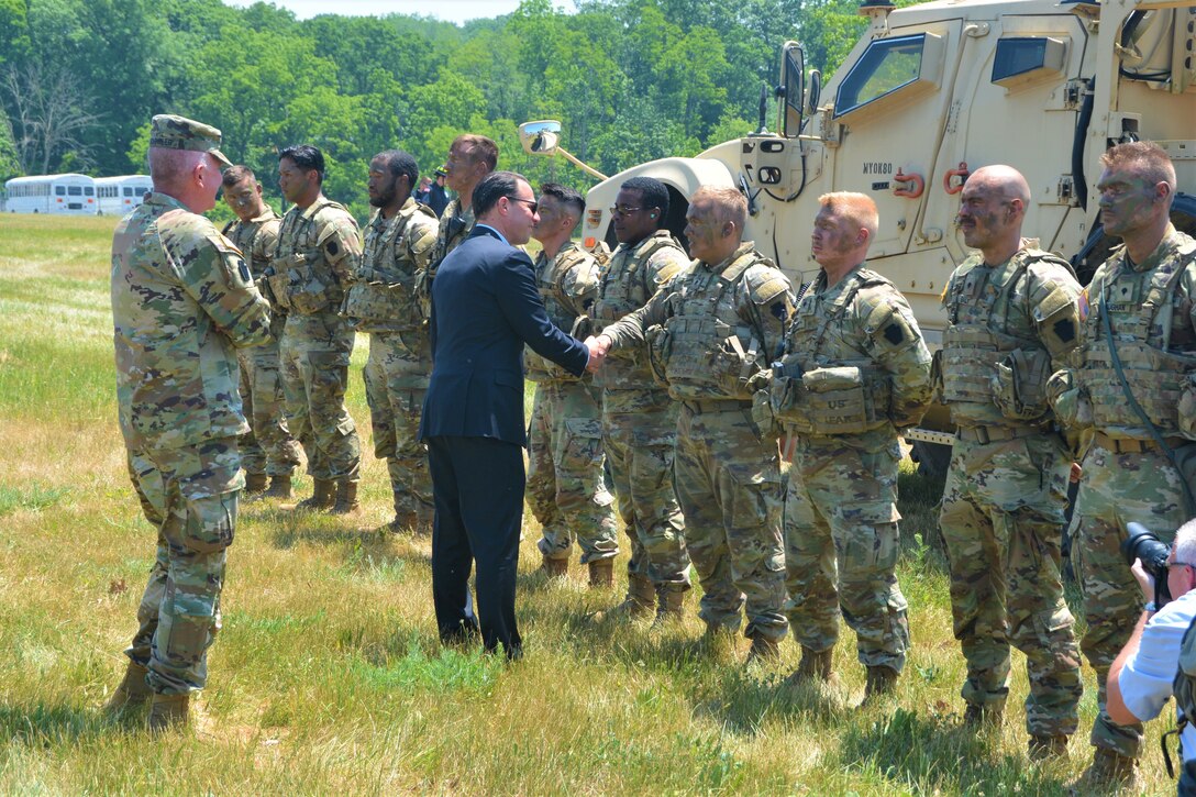 Pennsylvania Gov. Josh Shapiro meets with members of the Pennsylvania Army National Guard Ambassador Demonstration Team following a demonstration May 31, 2023, at Fort Indiantown Gap, Pa. At left is Pennsylvania Adjutant General Maj. Gen. Mark Schindler. The 15-member Ambassador Demonstration Team was recently formed to travel across the state to different events to help raise awareness of the National Guard and aid recruiting. (Pennsylvania National Guard photo by Brad Rhen)