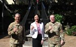 U.S. Air Force Gen. Ken Wilsbach, Pacific Air Forces commander, Kristyn Jones, assistant secretary of the Air Force for Financial Management and Comptroller, performing the duties of under secretary of the Air Force, and U.S. Air Force Chief Master Sgt. David Wolfe, PACAF command chief, stand together for a photo at Joint Base Pearl Harbor-Hickam, Hawaii, May 3, 2023. Jones directs the development of the Air Force program and budget, oversees the Air Force Cost Analysis Agency's acquisition and operational cost analysis, provides analytical services, and conducts Air Force accounting and finance operations. During her visit, she met with PACAF leaders to better understand PACAF’s overall infrastructure and mission opportunities and challenges relative to the Pacing Challenge and how PACAF competes, deters, and wins in the Indo-Pacific. (U.S. Air Force photo by Tech. Sgt. Nick Wilson)