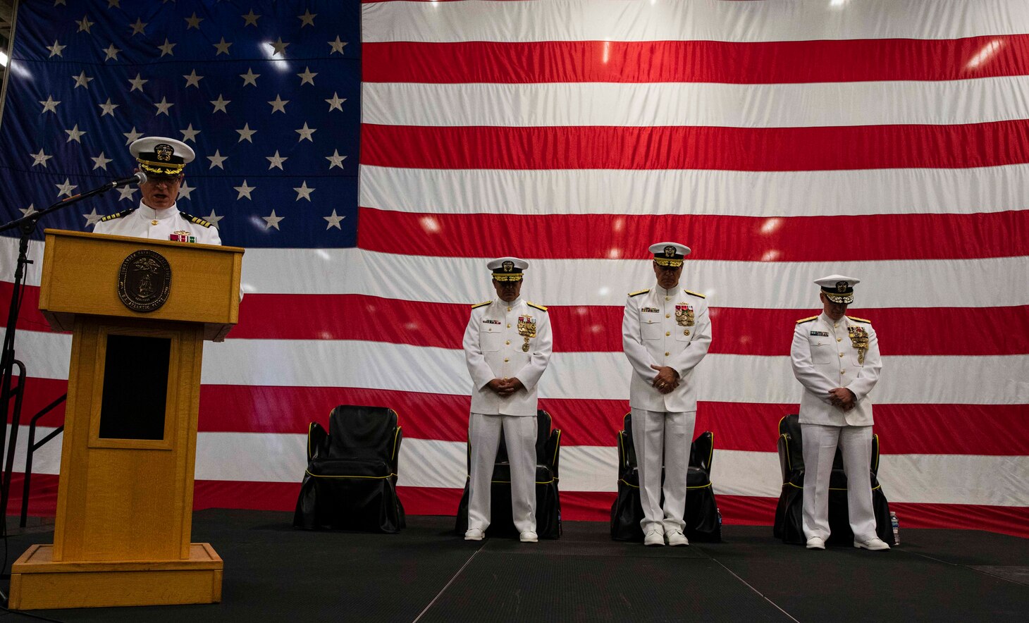 230602-N-KC543-1081 NORFOLK (June 2, 2023) Capt. David Thames, Naval Surface Force Atlantic force chaplain, delivers the benediction during the SURFLANT change of command ceremony aboard the amphibious assault ship USS Wasp (LHD 1), June 2, 2023. During the ceremony, Rear Adm. Joseph Cahill relieved Rear Adm. Brendan McLane as commander SURFLANT. (U.S. Navy photo by Mass Communication Specialist 1st Class Alora R. Blosch)