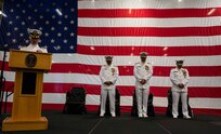 230602-N-KC543-1081 NORFOLK (June 2, 2023) Capt. David Thames, Naval Surface Force Atlantic force chaplain, delivers the benediction during the SURFLANT change of command ceremony aboard the amphibious assault ship USS Wasp (LHD 1), June 2, 2023. During the ceremony, Rear Adm. Joseph Cahill relieved Rear Adm. Brendan McLane as commander SURFLANT. (U.S. Navy photo by Mass Communication Specialist 1st Class Alora R. Blosch)