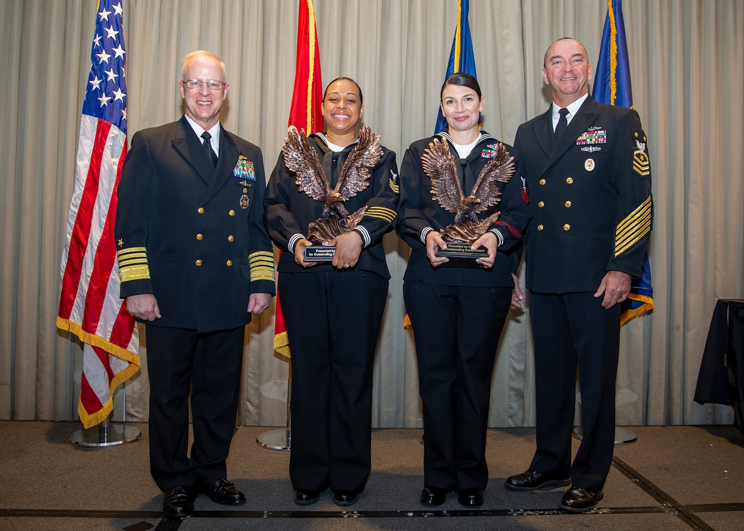 NORFOLK, Va. (June 2, 2023) Adm. Daryl Caudle, commander, U.S. Fleet Forces Command (USFFC), left, and Fleet Master Chief John Perryman, right, pose with the 2022 USFFC Sea Sailor of the Year (SOY) Operations Specialist 1st Class Kandace Tomkin, of Commander, Task Force 80, from Weisbaden, Germany, center left, and the USFFC Shore SOY Hospital Corpsman 1st Class Heather Rufohuse, of United States Marine Corps Forces Command, from Cleveland, Ohio. The SOY program was established in 1972 by Chief of Naval Operations Adm. Elmo Zumwalt and Master Chief Petty Officer of the Navy John Whittet, to recognize the fleet’s top performing Sailors. (U.S. Navy photo by Mass Communication Specialist 3rd Class Grace Lyles)