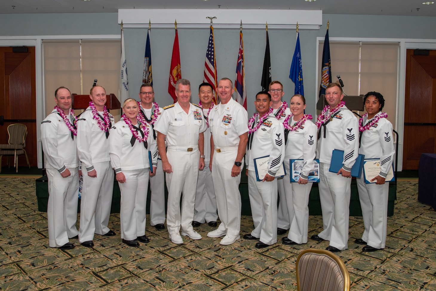 Adm. Samuel Paparo, commander of U.S. Pacific Fleet, and Fleet Master Chief James “Smitty” Tocorzic pose for a photo with Sailor of the Year nominees aboard Joint Base Pearl Harbor-Hickam. The SOY program, established in 1972, recognizes those who exemplify a warfighting spirit, the Navy’s core values, and a deep commitment to their commands and communities. (U.S. Navy photo by Mass Communication Specialist 1st Class Nick Bauer)