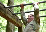 Army National Guard noncommissioned officers and Soldiers run the confidence course during the Region II Best Warrior Competition May 17, 2023, at Fort Barfoot, Virginia. The Soldiers and NCOs of the Year from Virginia, Maryland, Delaware, West Virginia, Pennsylvania and the District of Columbia competed for the right to represent the region at the national competition in Alaska in July.