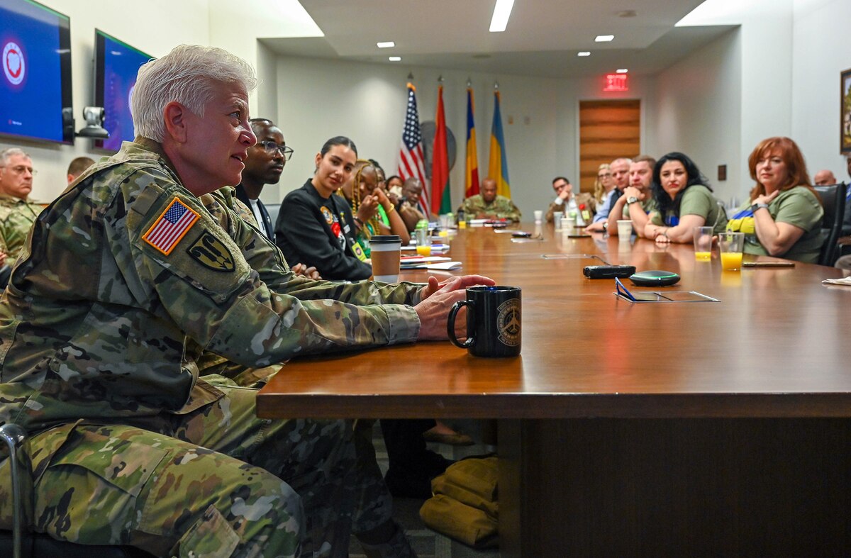 Maj. Gen. Giselle Wilz, director of staff, National Guard Bureau (NGB), speaks with Bonnie Carroll, president and founder of the Tragedy Assistance Program for Survivors (TAPS)