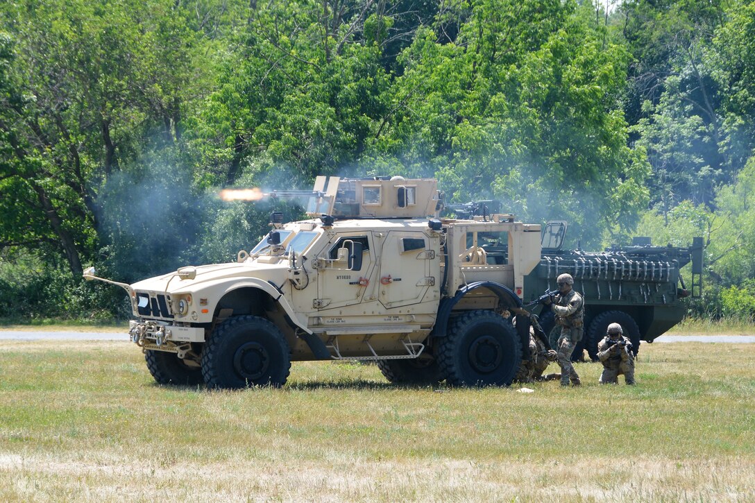 The Pennsylvania Army National Guard Ambassador Demonstration Team performs a live-action demonstration May 31, 2023, at Fort Indiantown Gap, Pa. The 15-member team was recently formed to travel across the state to different events to help raise awareness of the National Guard and aid recruiting. (Pennsylvania National Guard photo by Brad Rhen)