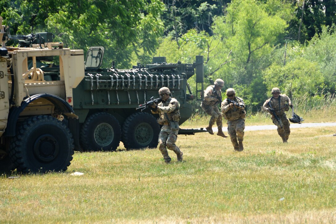 The Pennsylvania Army National Guard Ambassador Demonstration Team performs a live-action demonstration May 31, 2023, at Fort Indiantown Gap, Pa. The 15-member team was recently formed to travel across the state to different events to help raise awareness of the National Guard and aid recruiting. (Pennsylvania National Guard photo by Brad Rhen)