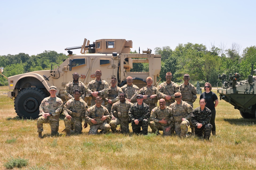 The Pennsylvania Army National Guard Ambassador Demonstration Team poses for a photo following a demonstration May 31, 2023, at Fort Indiantown Gap, Pa. The 15-member team was recently formed to travel across the state to different events to help raise awareness of the National Guard and aid recruiting. (Pennsylvania National Guard photo by Brad Rhen)