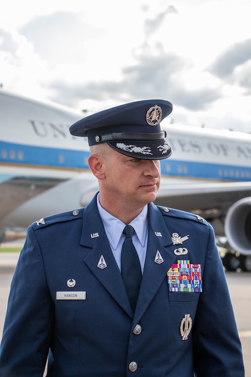  U.S. Space Force Col. David Hanson, commander, Space Base Delta 1, stands in front of Air Force One after welcoming President Joe Biden to Peterson Space Force Base May 31, 2023. (U.S. Space Force photo by Emily Peacock)