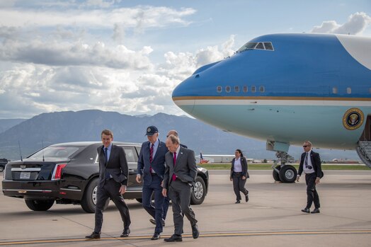  Colorado Senator Michael Bennet (left) and Colorado Springs Mayor John Suthers (right) welcome U.S. President Joe Biden to Peterson Space Force Base May 31, 2023. (U.S. Space Force photo by Emily Peacock)