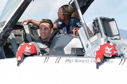  Tech. Sgt. Kayla Stennis, a crew chief for the U.S. Air Force Demonstration Squadron “Thunderbirds,” conducts final checks before eight-time Olympic medalist Apolo Ohno departs on and incentive flight from Peterson Space Force Base, Colorado, May 31, 2023. Prior to takeoff, Ohno received thorough training to prepare him for the flight. (U.S. Space Force photo by Airman 1st Class Justin Todd)