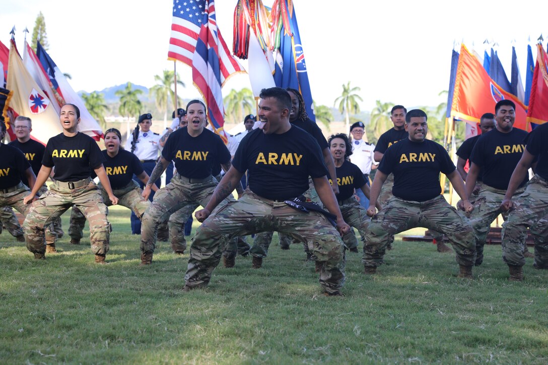 The 25th Infantry Division Nui Ha'a Koa demonstrates Ha'a at the Mana O Ke Koa “Spirit of the Warrior” civilian community service award ceremony at Palm Circle, Fort Shafter, Hawaii, on June 2, 2023. The civilian community service award honors community leaders who have distinguished themselves by their support to Soldiers, their families, and the Army community in the Pacific. (U.S. Army photo by Pfc. Christopher Smith)
