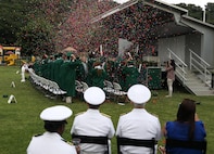 Naples Middle\High School class of 2023 celebrates graduating at Carney Park in Pozzuoli, Italy, on June 1, 2023. U.S. Sixth Fleet is permanently assigned to NAVEUR-NAVAF, and employs maritime forces through the full spectrum of joint and naval operations.