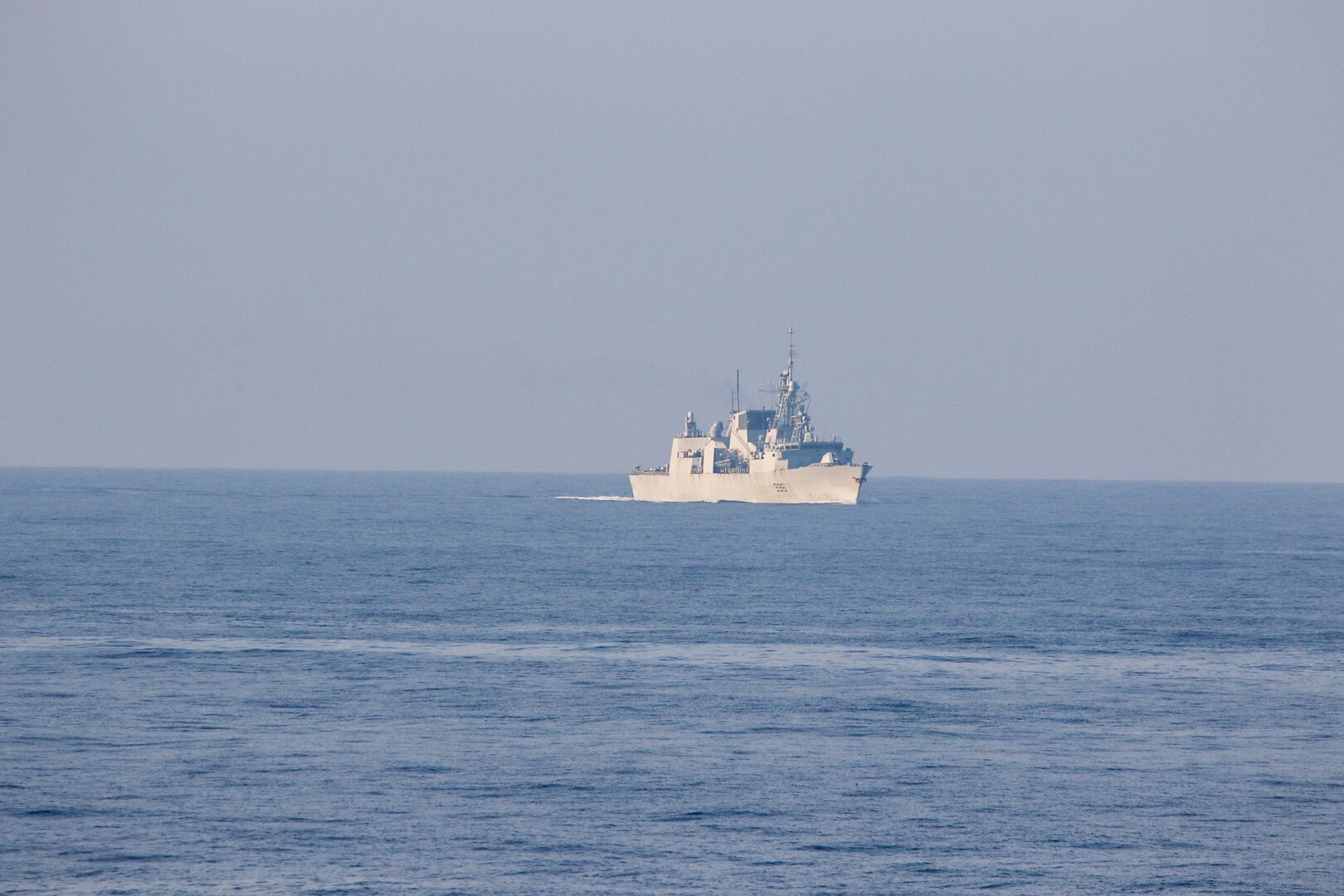 Halifax-class frigate HMCS Montreal (FFG 336) sails alongside the Arleigh Burke-class guided missile destroyer USS Chung-Hoon (DDG 93) during a transit through the Taiwan Strait. USS Chung-Hoon is on a routine deployment to U.S. 7th Fleet and is assigned to Commander, Task Force (CTF 71)/ Destroyer Squadron (DESRON) 15. CTF 71/DESRON 15 is the largest forward-deployed DESRON and the U.S. 7th Fleet’s principal surface force.