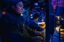Lt. Heather Brown communicates with allies aboard the Arleigh Burke-class guided-missile destroyer USS Chung-Hoon (DDG 93) during a Taiwan Strait transit. USS Chung-Hoon is on a routine deployment to U.S. 7th Fleet and is assigned to Commander, Task Force (CTF 71)/ Destroyer Squadron (DESRON) 15. CTF 71/DESRON 15 is the largest forward-deployed DESRON and the U.S. 7th Fleet’s principal surface force.